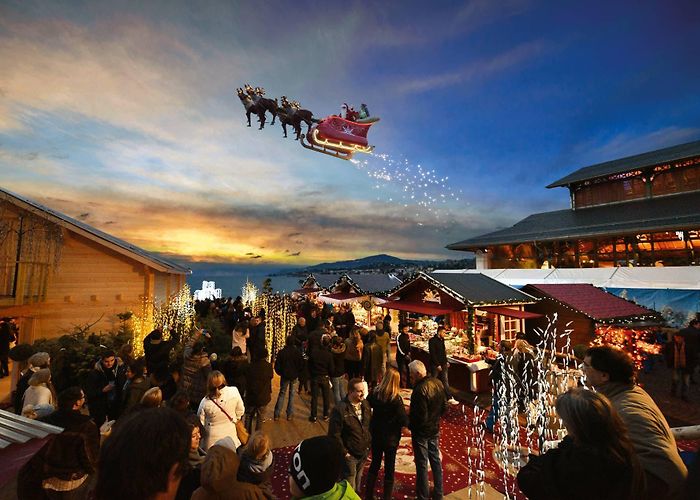 Montreux Christmas Market Montreux Noël - The Market Place and Santa Claus on his flying sleigh photo